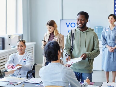 American votes line up a their polling place to cast ballots