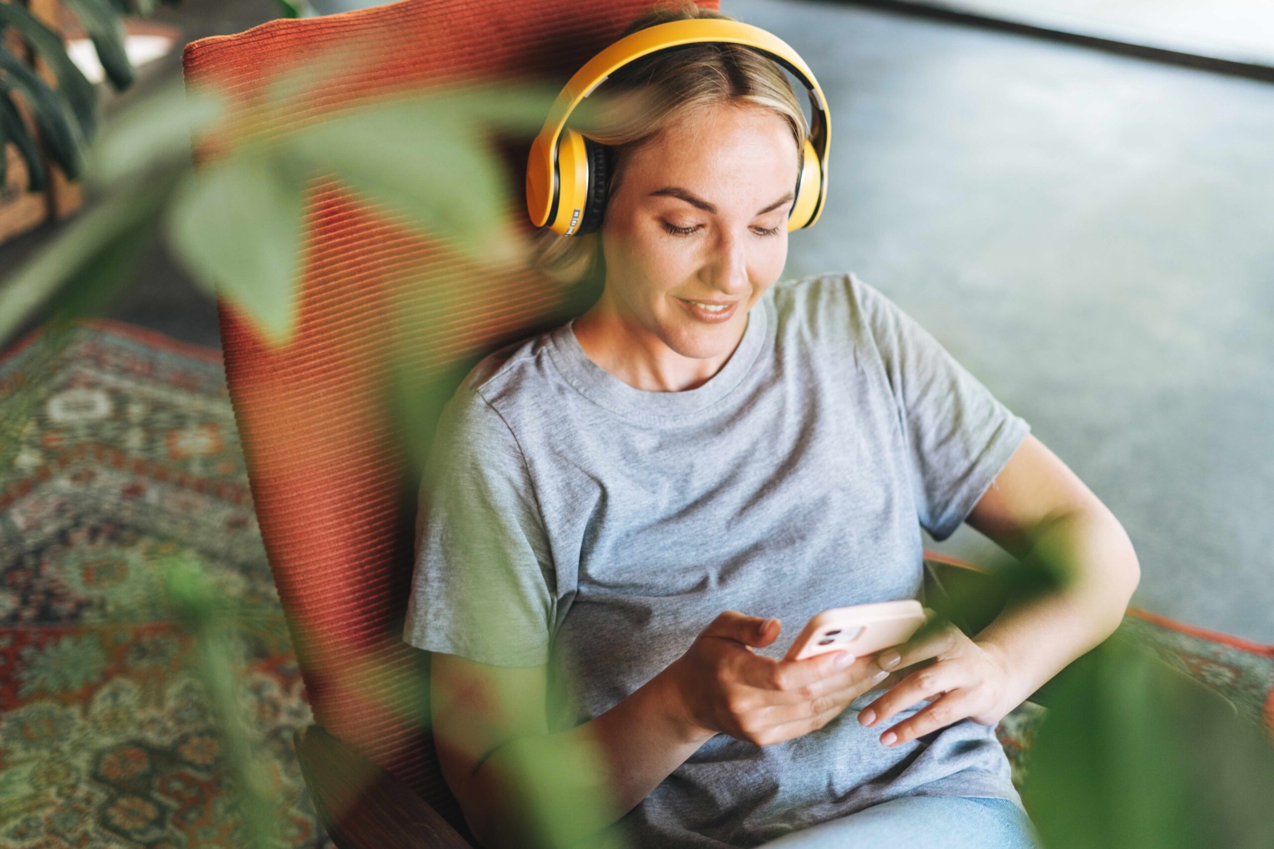 woman-relaxing-in-chair-listening-to-music-2026-03-09-22-10-30-utc