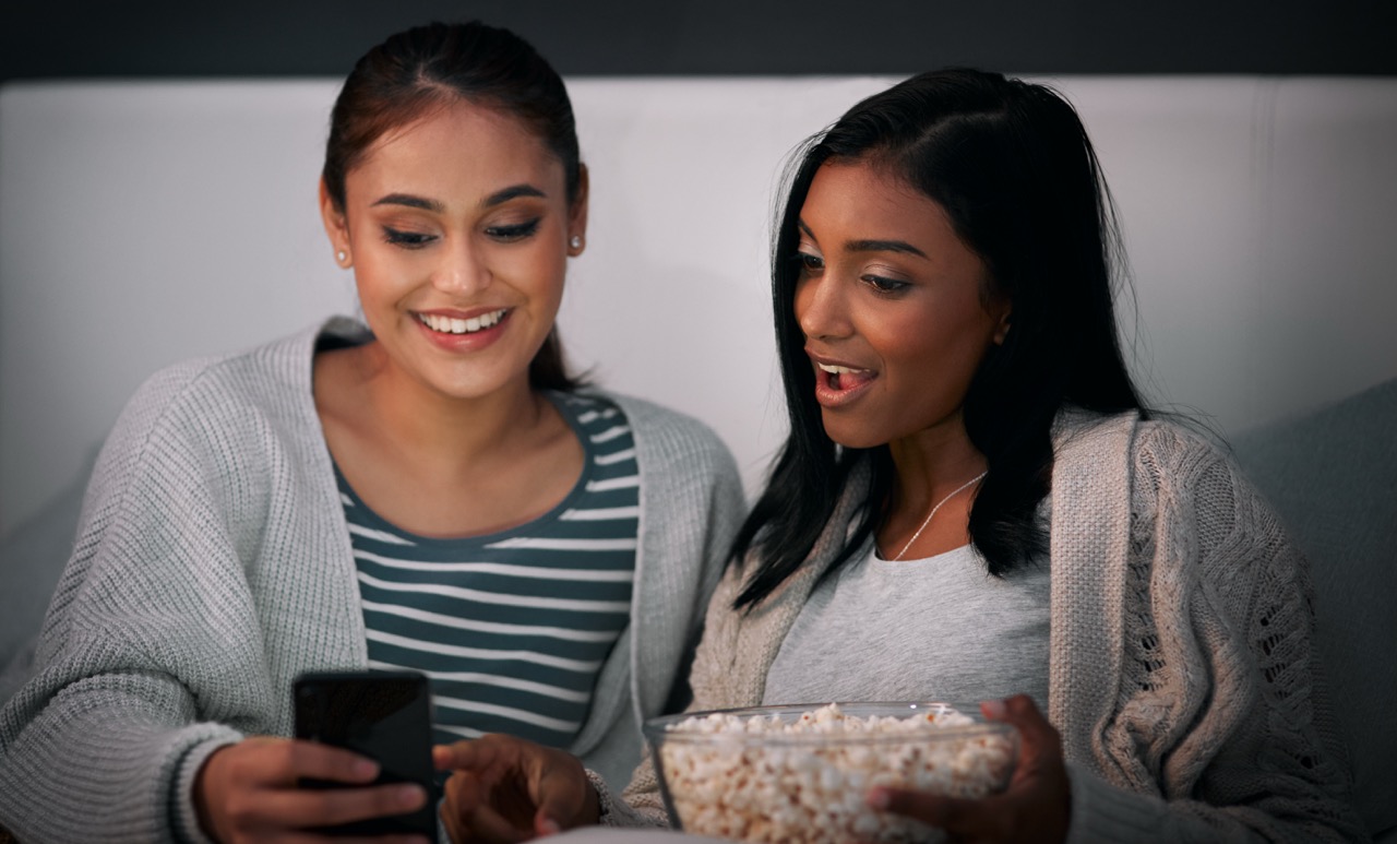 two-young-women-relaxing-at-home-watching-phone-2026-09-24-15-03-39-utc Large two-young-women-relaxing-at-home-watching-phone-2026-09-24-15-03-39-utc Large